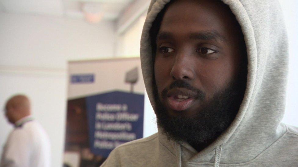 Image of Abdi Hirsi, wearing a grey hoodie.