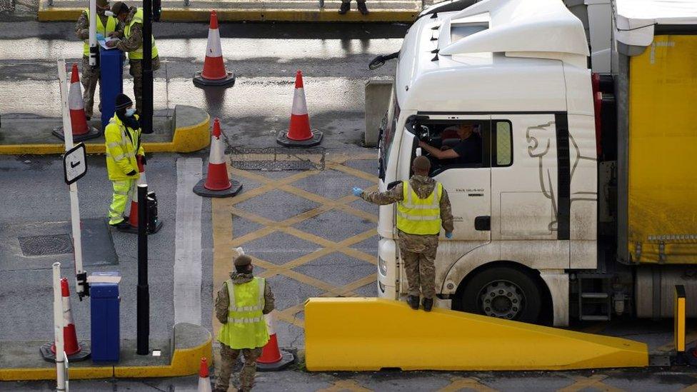 Members of the Army wave a lorry driver through to the Port of Dover on Christmas Day 2020