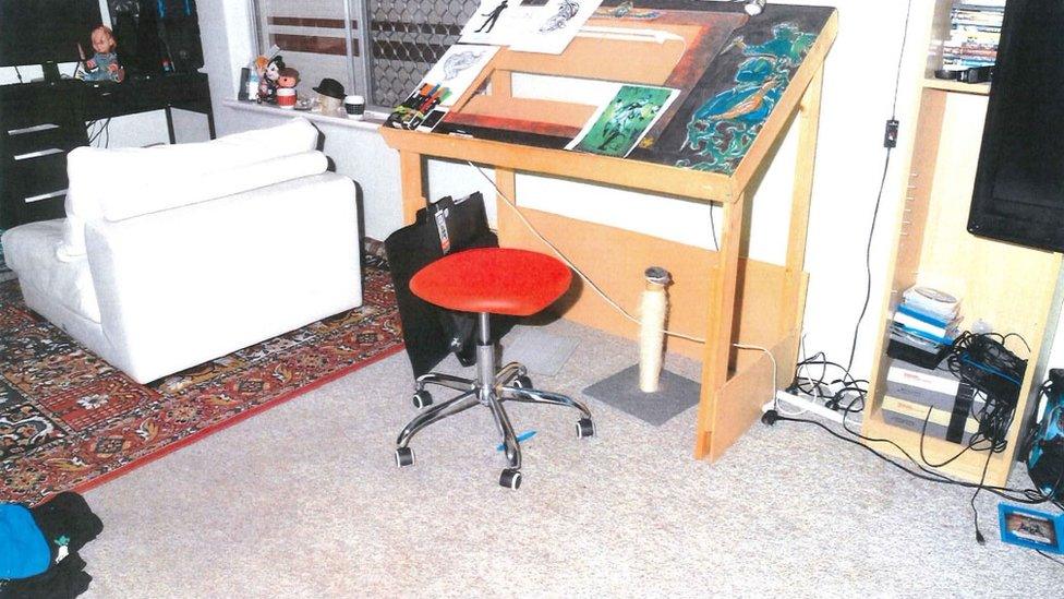 The room in which police believe that Aaron Pajich was murdered. Left, a rug and a white couch cover the spot where a large square of carpet was ripped from the floor.