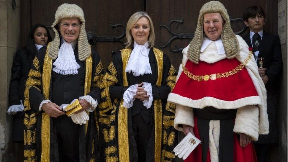 Liz Truss with Lord John Thomas the Lord Chief Justice of England and Wales (R) and Lord John Dyson, the Master of the Rolls at the Royal Courts of Justice