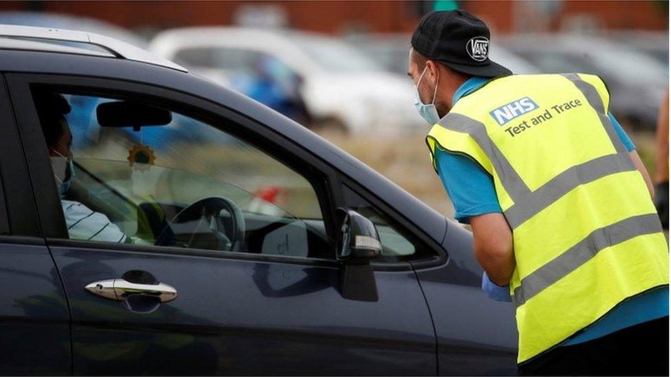 A man arrives at a drive-through test facility following the outbreak of the coronavirus disease (COVID-19) in Bolton