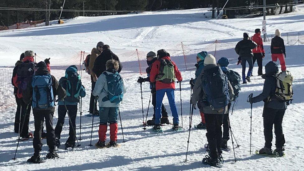 Skiers at Plateau de Beille