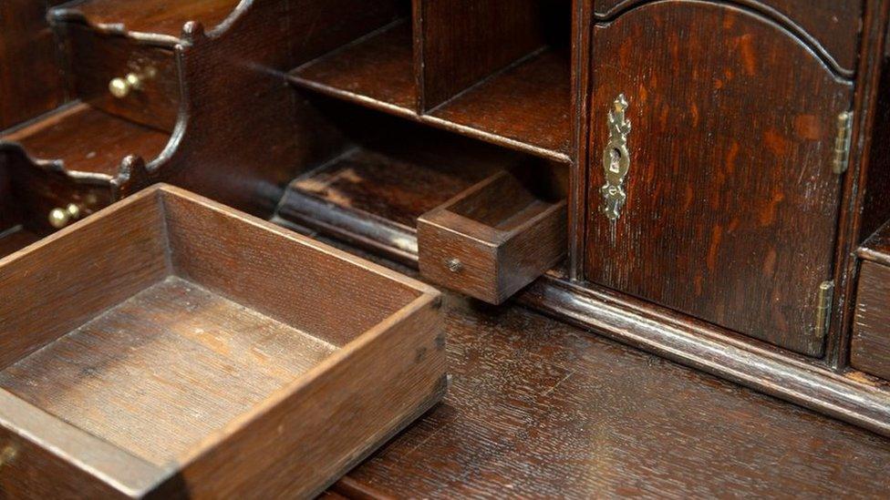 The hidden drawer in the bureau