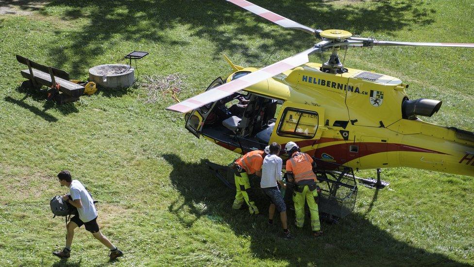 A group of hikers are evacuated from a cut-off mountain hut in Bondo, Graubuenden, South Switzerland, 24 August 2017