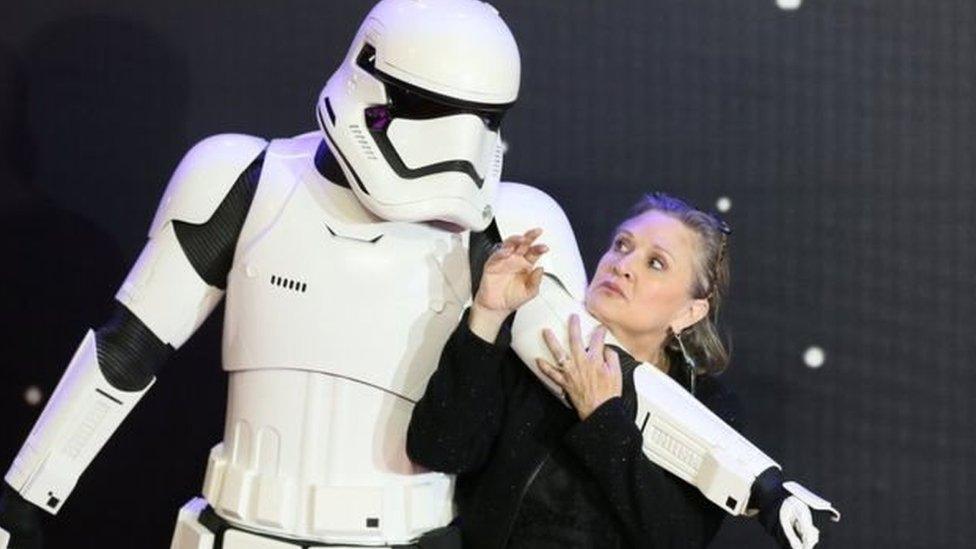 Stormtrooper pictured with Carrie Fisher at Star Wars event