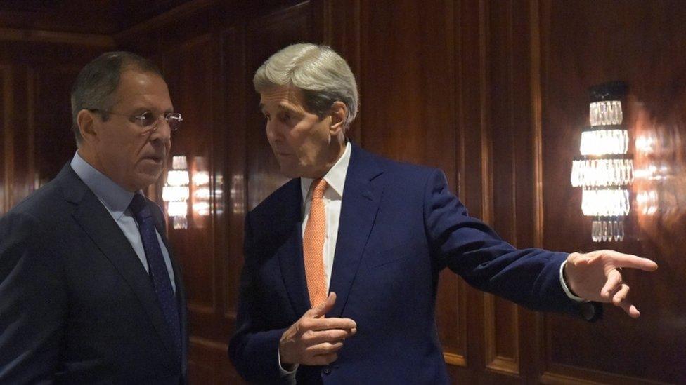 Russian Foreign Minister Sergei Lavrov (L) and US Secretary of State John Kerry (R) during their meeting at the Imperial Hotel in Vienna