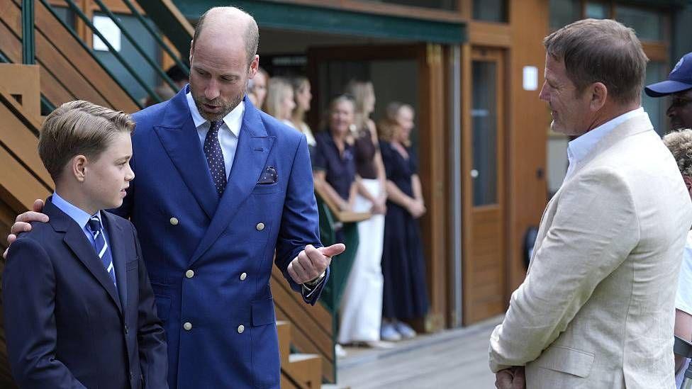 The Prince of Wales and Prince George meet Steve Backshall during day fourteen of the Wimbledon 2025 championships.