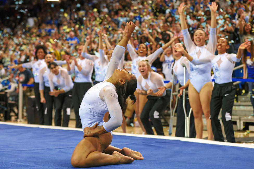 Olympic gold medal winner Jordan Chiles of the UCLA Bruins competes in the floor exercise against the Michigan State Spartans at Pauley Pavilion in Los Angeles, California