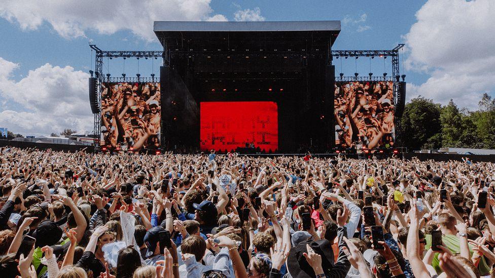 Sammy Vriji performing on a huge stage in front of thousands of fans at Parklife 