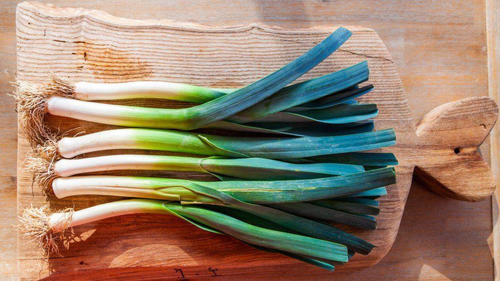 Leeks on a chopping board