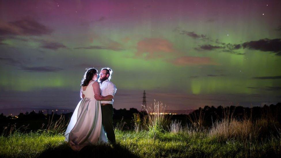 Newly weds and Aurora Borealis