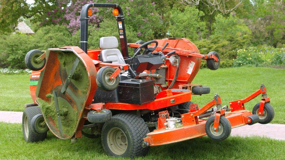 a sit on lawn mower