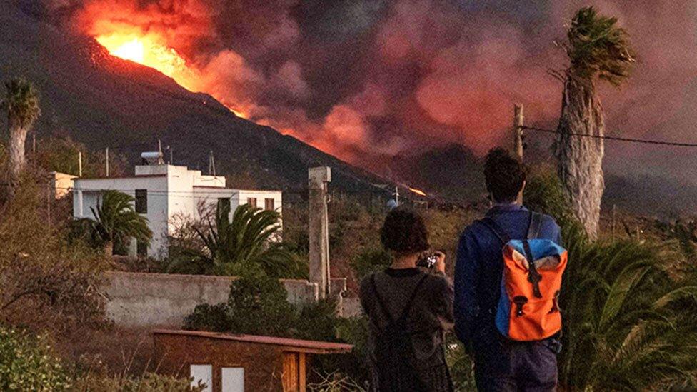 People watching the lava flow