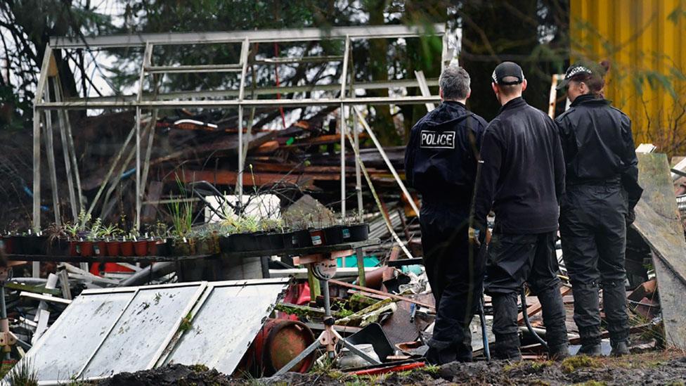 Police searching the garden