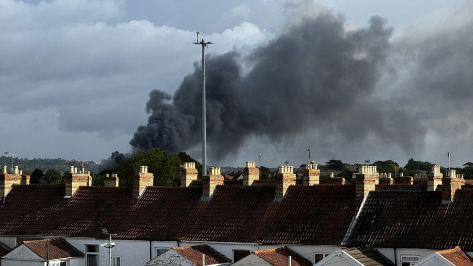 Smoke seen over roof tops