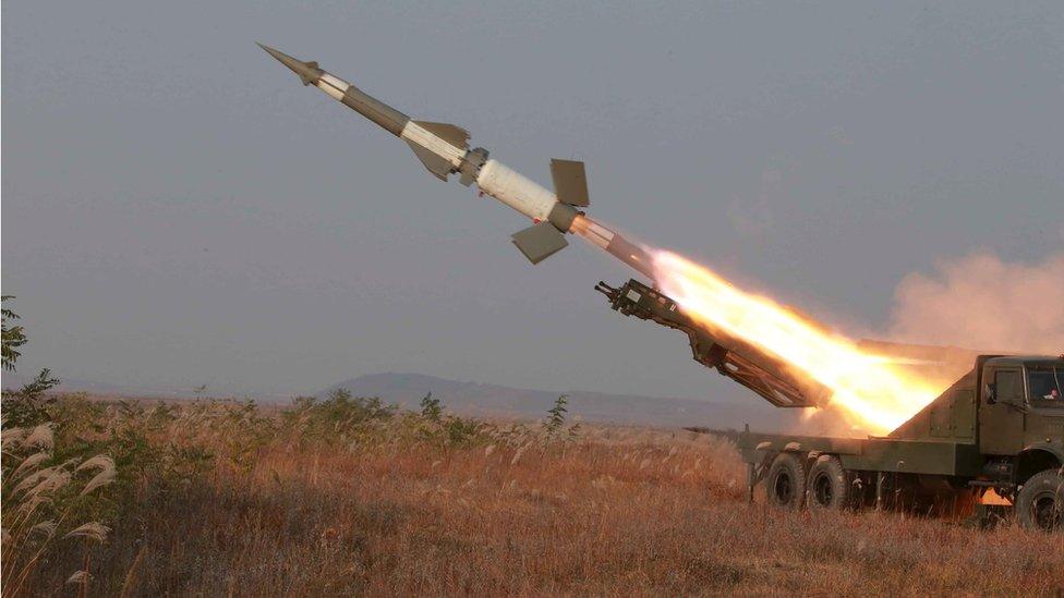 A rocket is fired during a drill by anti-aircraft units of the Korean People's Army