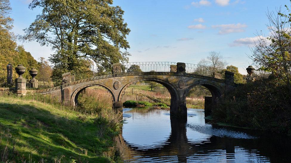 A bridge over the River Dearne at the Yorkshire Sculpture Park near Wakefield