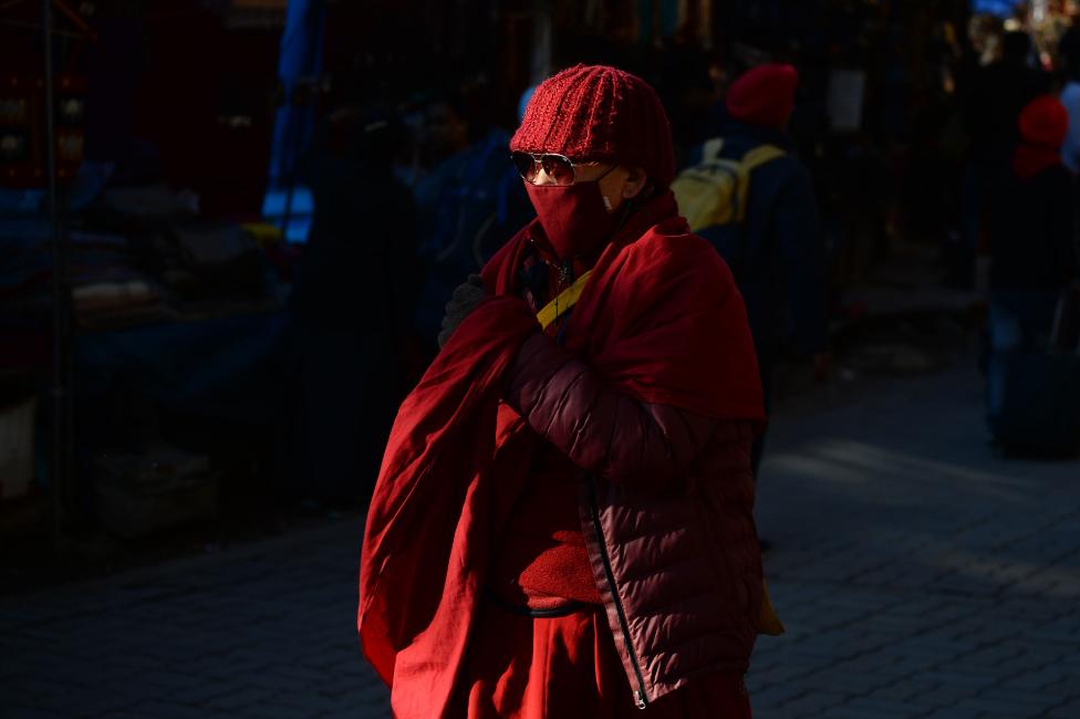 Monk in McLeod Ganj wearing mask