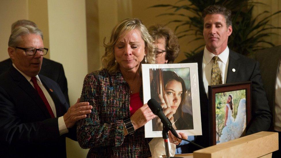 The case of Brittany Maynard (shown in a picture held by her mother) helped draw support for the law