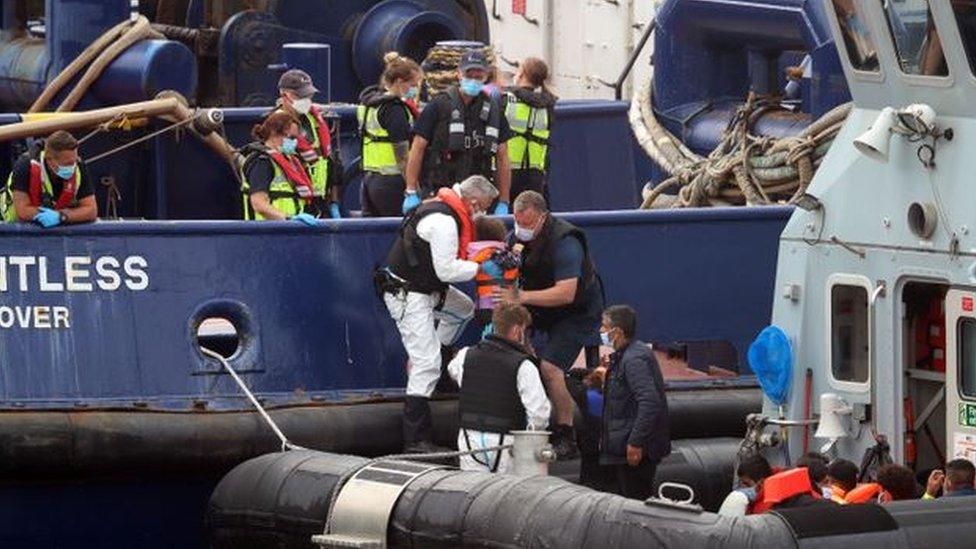 A child pictured among migrants