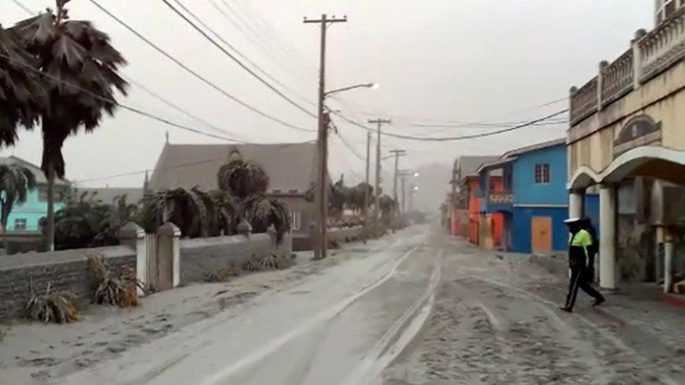 Ash covers road in Georgetown, five miles from the volcano