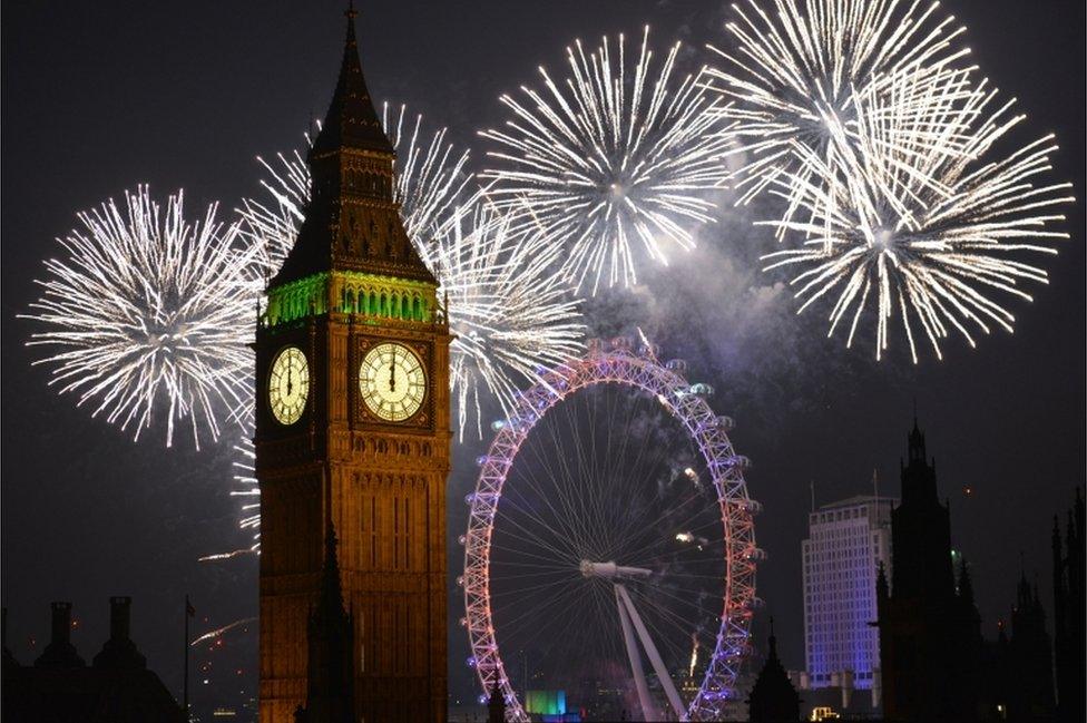 Fireworks over Big Ben and Millennium Wheel on 2015 New Year's Day