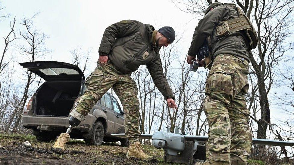 Ukrainian servicemen prepare a Leleka unmanned aerial vehicle (UAV) for flying at a front line, Zaporizhzhia region, 15 February 2024.