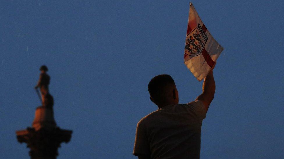 England fan in Trafalgar Square during the match