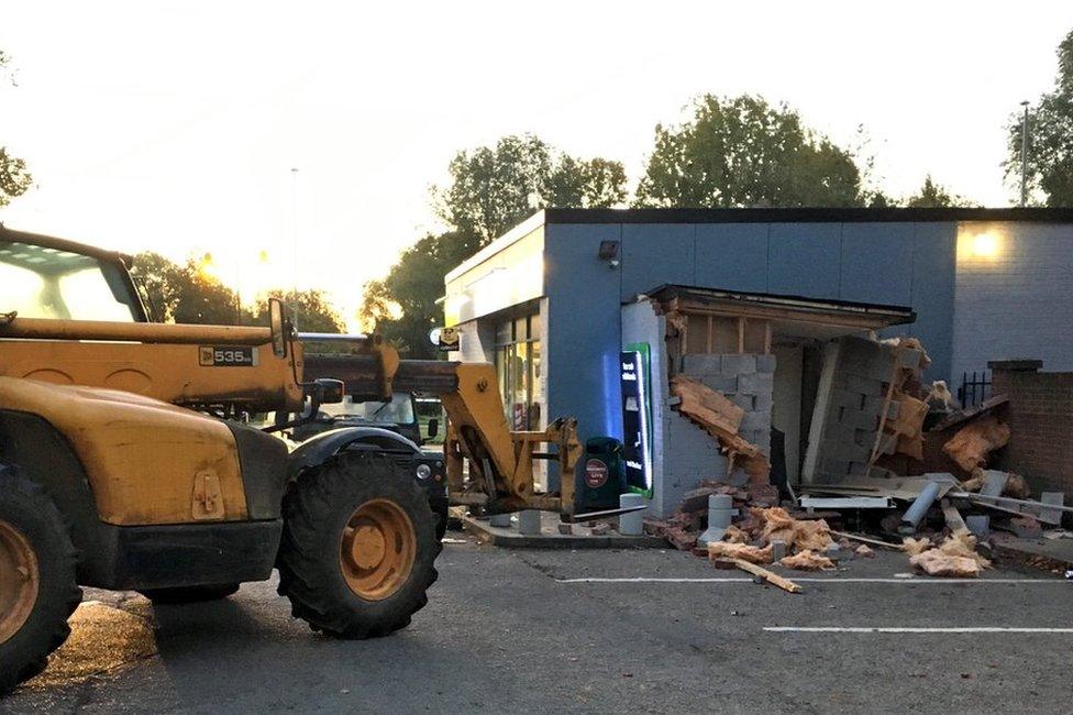 Scene after cash machine was ripped from wall