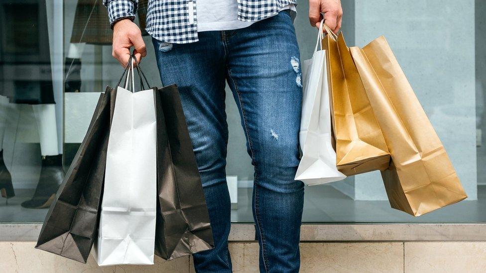 Man carrying shopping bags