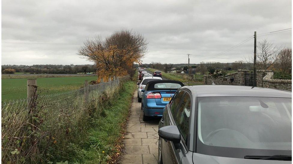 Cars parked on Station Road, Moira