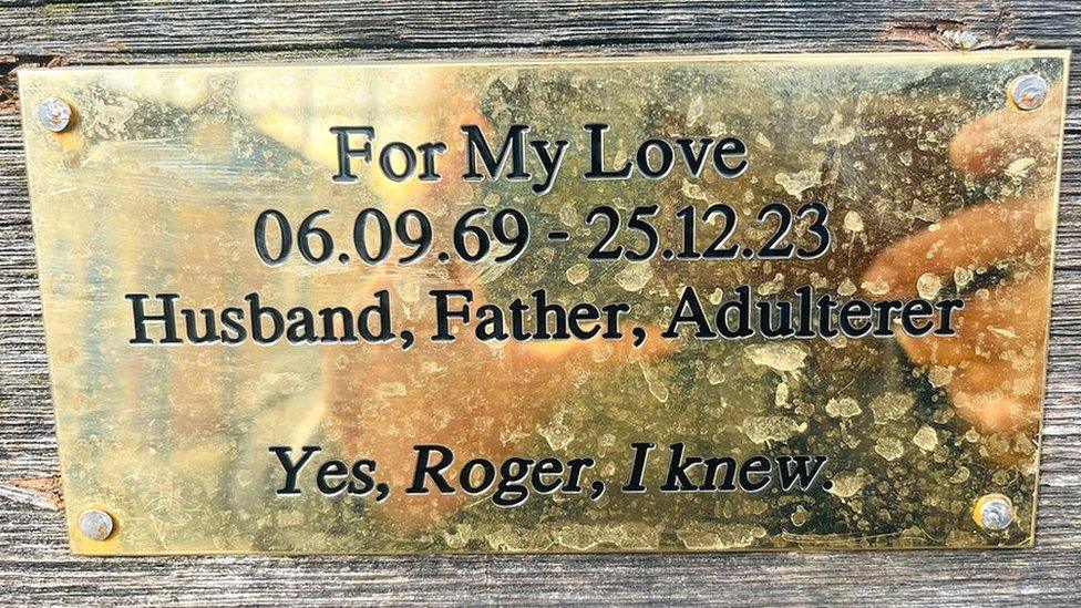 A plaque on a bench saying someone "knew" a man called Roger was an adulterer