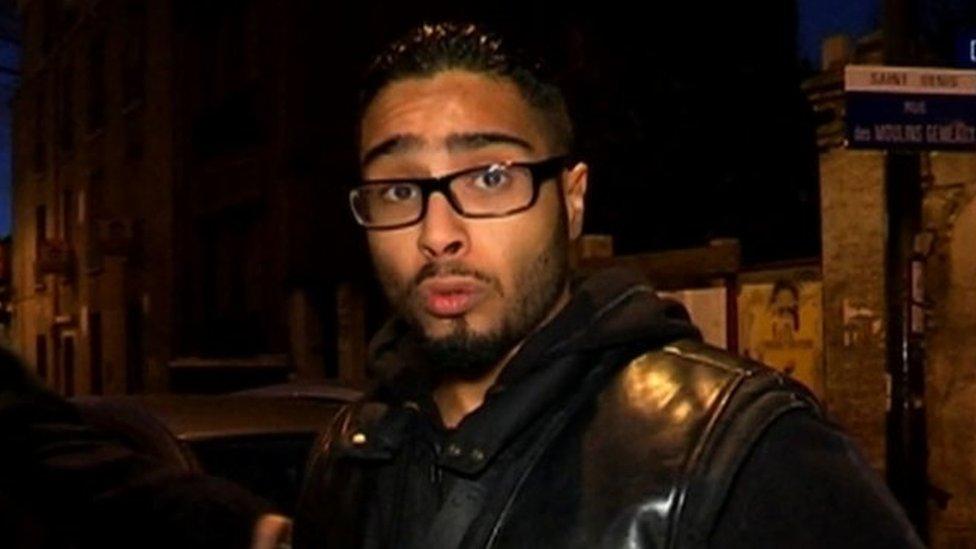 A file image grab made from a handout video taken on November 18, 2015 and released on November 25, 2015 by BFMTV shows Jawad Bendaoud, the man who allegedly lent his Paris suburb apartment to the suspected ringleader of the attacks on Paris, being arrested in Saint-Denis. Bendaoud, who lodged Paris attacks ringleader, is set to appear at Paris courthouse on January 24, 2018,