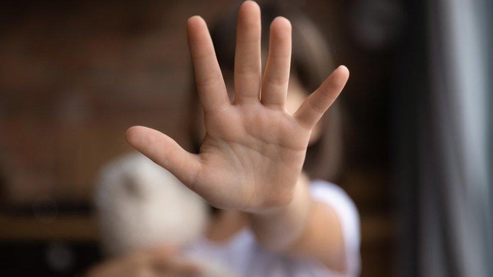 A child's hand