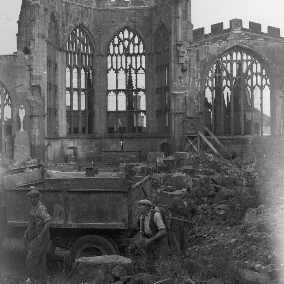 Rubble is pictured being removed from the bombed out cathedral in 1948