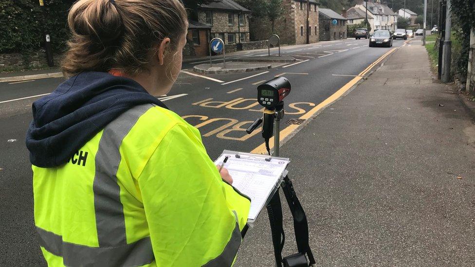 A speed camera on a road