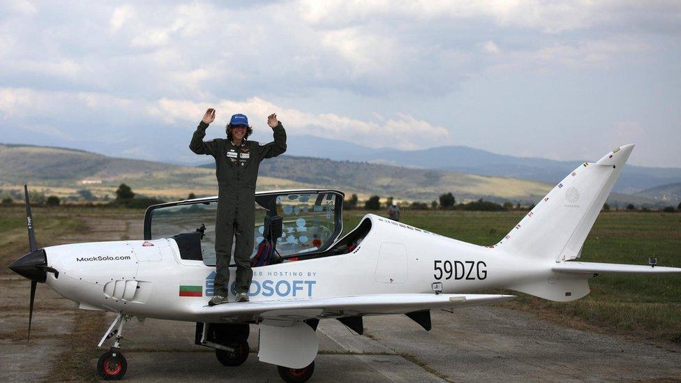 Mack Rutherford, 17, celebrating after landing near Sofia in Bulgaria on Wednesday