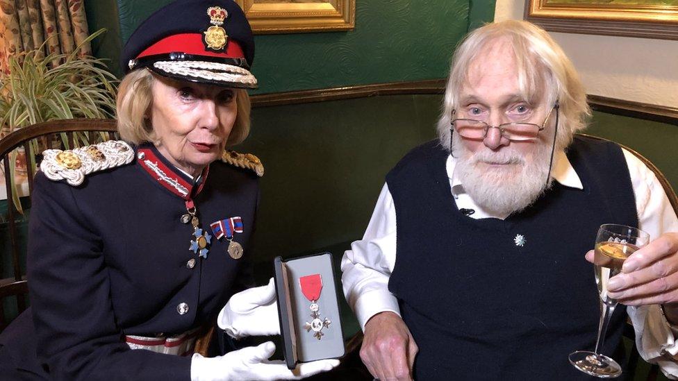 John Mills being appointed MBE