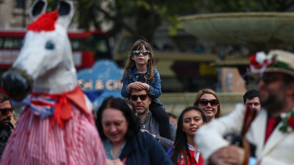 Members of the public attend the Feast of St George celebrations in Trafalgar Square