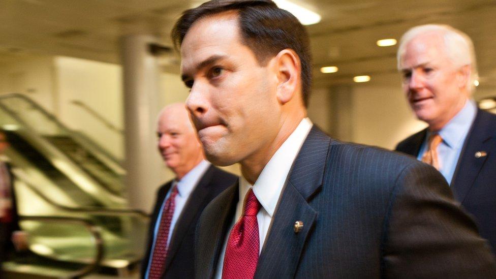 Marco Rubio walks through the halls of Congress.