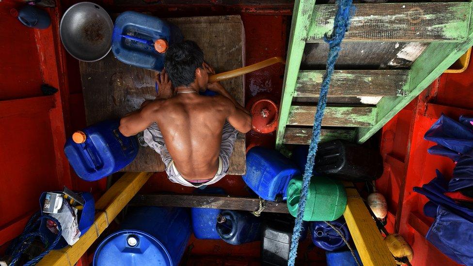 Filipino fishermen prepare and resupply their boat for another fishing trip to the Spratlys, on 10 July, 2016 in Mariveles, Bataan, Philippines