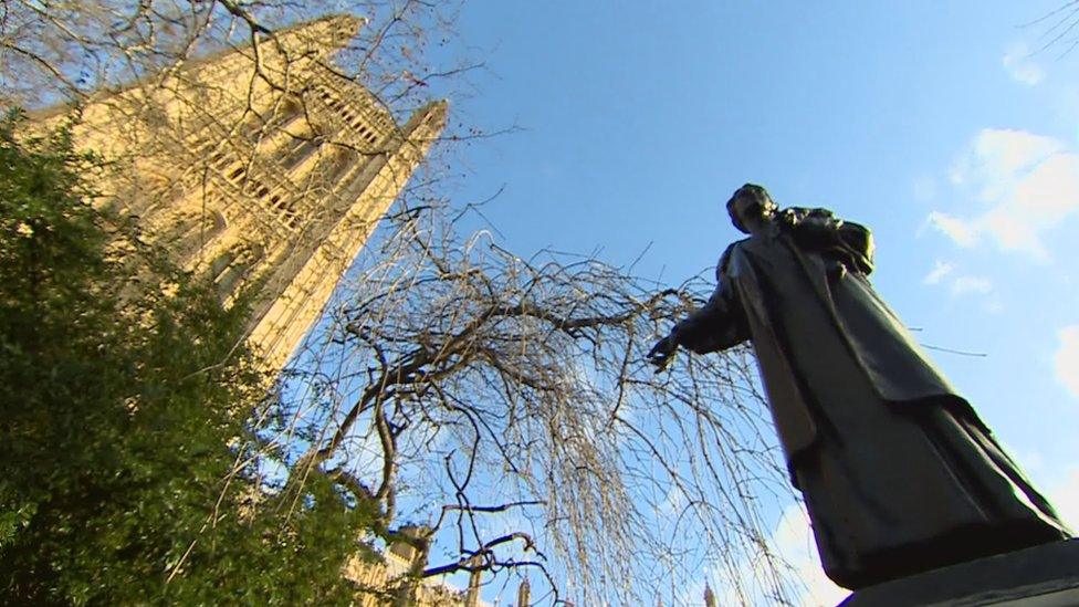 A statue of Emmeline Pankhurst stands near the Houses of Parliament in London