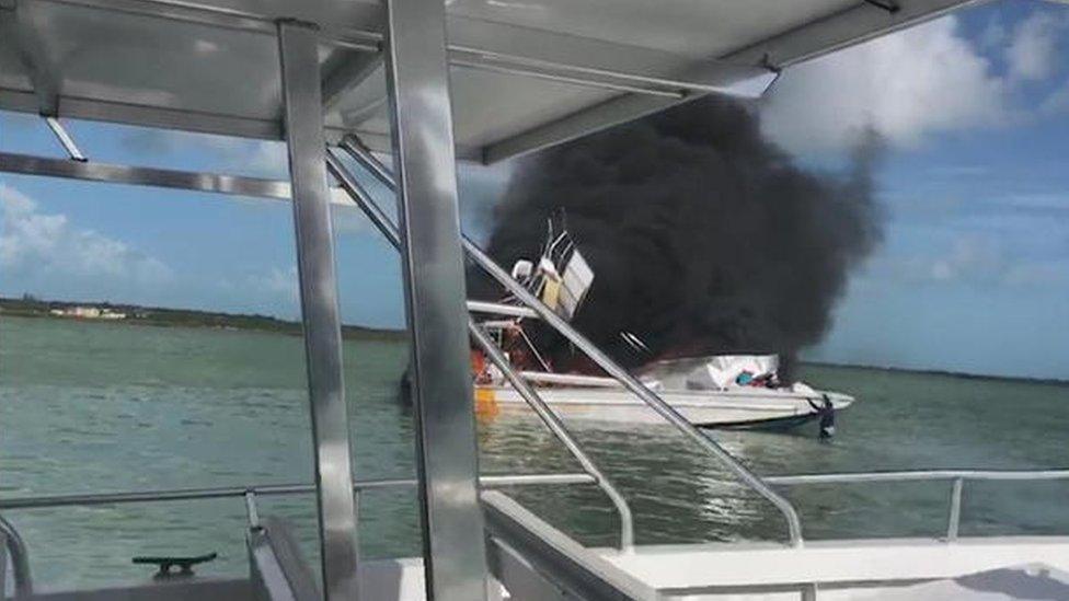 Video posted online shows the boat engulfed by flamed and smoke after the blast.