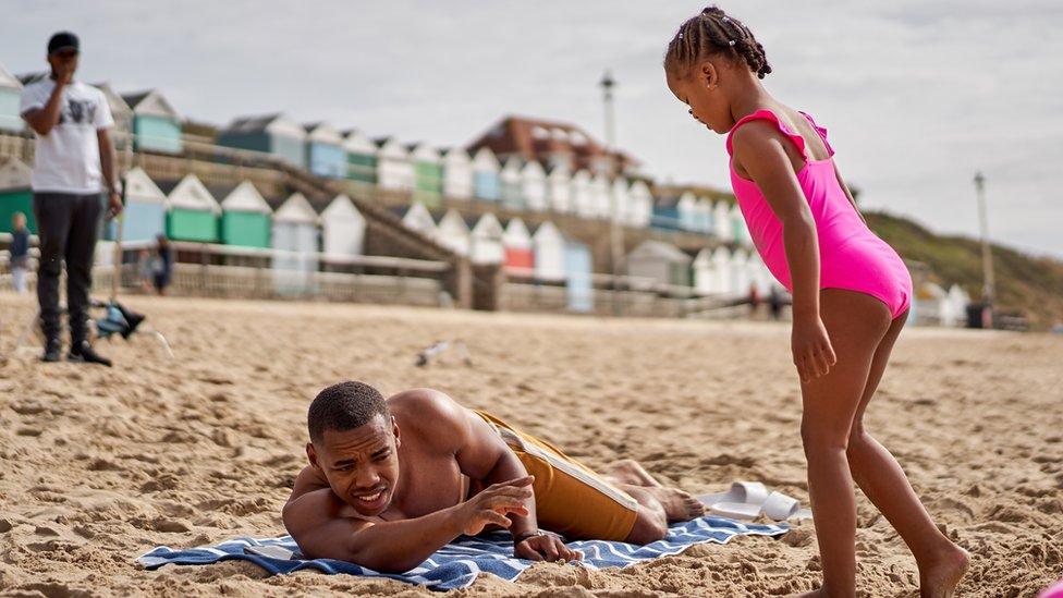 A scene in the third episode shows Shiro on the beach with his daughter