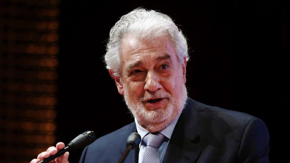 Placido Domingo speaking into a microphone