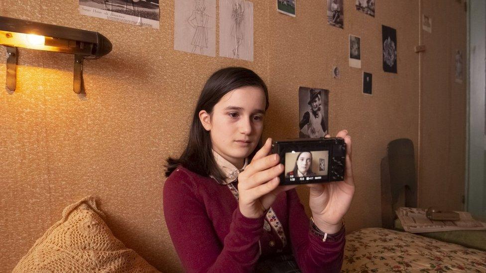 anne-frank-staring-at-a-camera