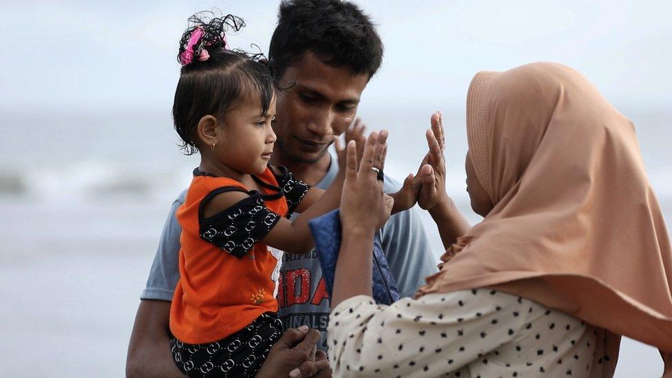 Ali Jasmin with his family on Kuta beach