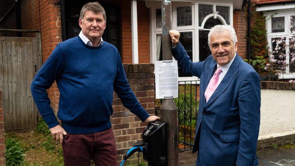 char.gy's founder Richard Stobart and Councillor Stephen Alambritis at charge point in Merton.