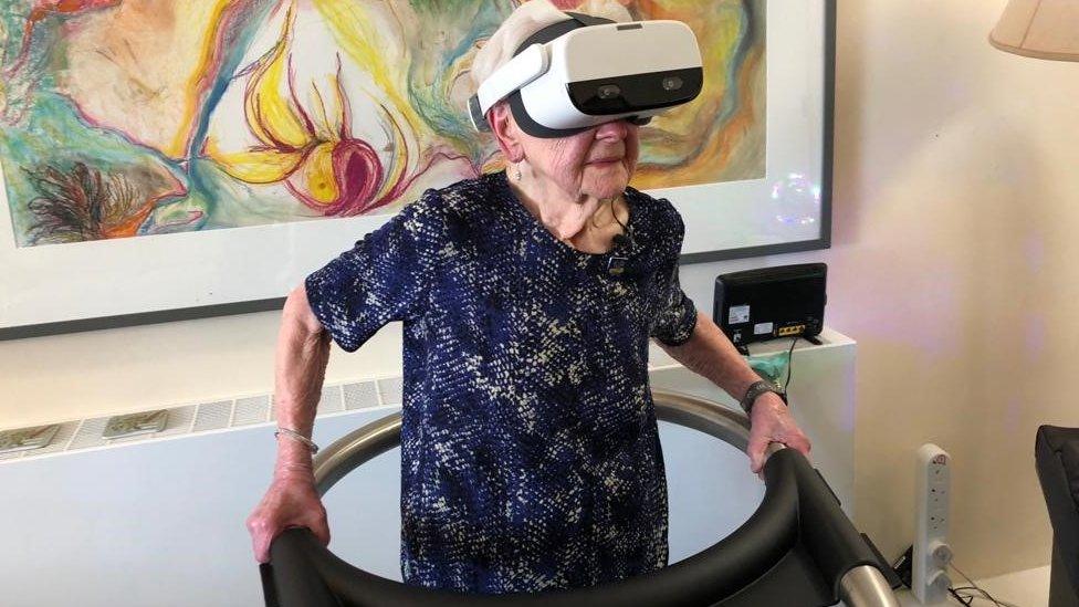 Joyce Penfold wearing the virtual reality headset