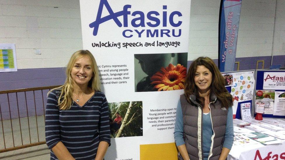 Two family support workers attending an Afasic Cymru information day